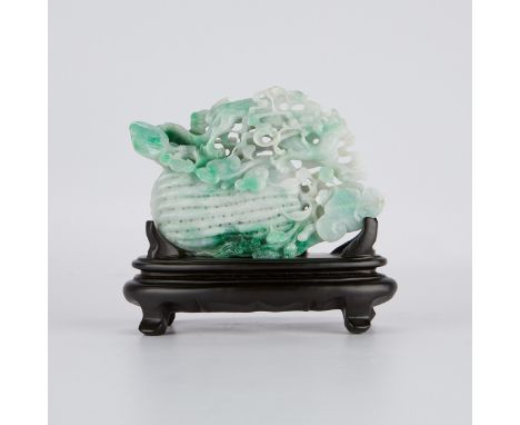Large Chinese jade carving of a melon, carved from green and white jade. The carving with lovely pierced detail. With a woode
