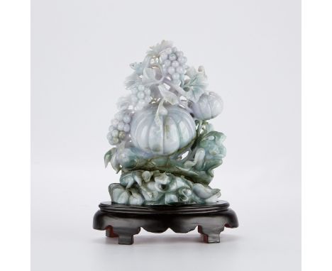 Enormous Chinese jade carving of an abundance of pumpkins and grapes, carved of lavender and spinach jade. The natural color 