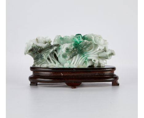 Chinese Republic period jade carving in the form of a group of lotus petals, carved of mottled green and white jade. The carv