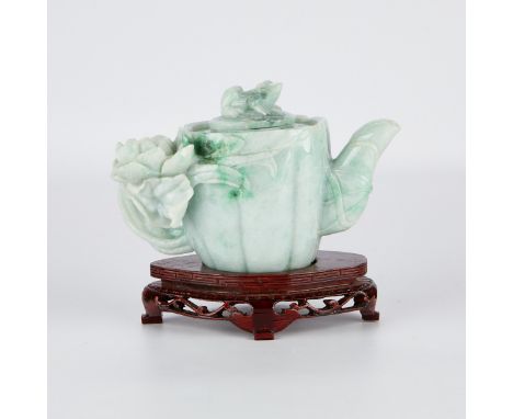 Chinese Republic period carved jade teapot in the form of a lotus pod. Delicately carved of mottled white and green jade, wit
