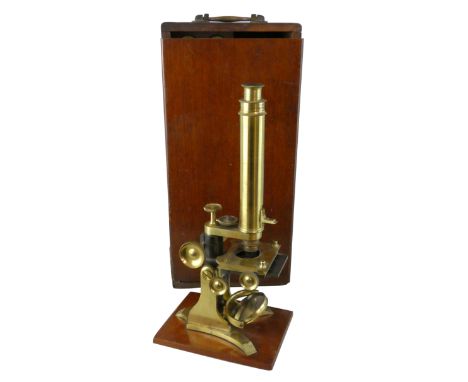 A Victorian monocular brass microscope, by J.P. Cutts, Sutton &amp; Son, c. 1850 - 1876, with brass hinged body, signed I.P. 