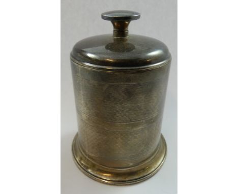 A silver cigarette dispenser, Birmingham 1935, with pull up cover, Bakelite interior and engine turned decoration, height 12 