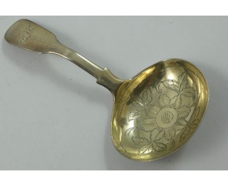 A George III silver fiddle pattern caddy spoon, by James Henry Daniel, London 1804, with floral engraved gilded bowl, initial