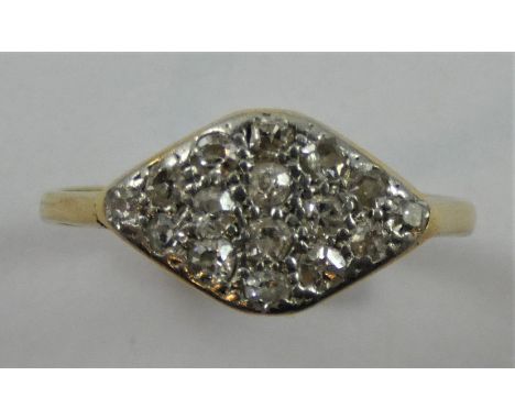 An 18ct gold diamond set panel ring, set with single cut stones, size N.