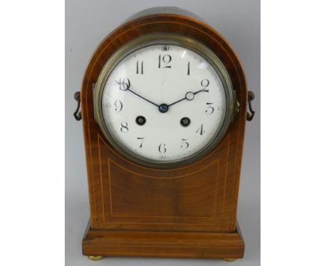 A Victorian mahogany and boxwood strung dome top mantle clock, the white enamel dial with Arabic numerals, the French movemen