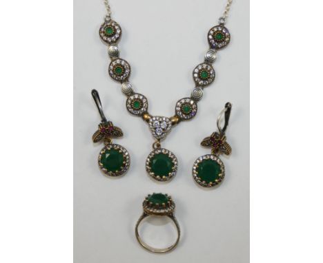A silver, green and white paste cluster suite, stamped 925, the central cluster drop with three smaller clusters to either si