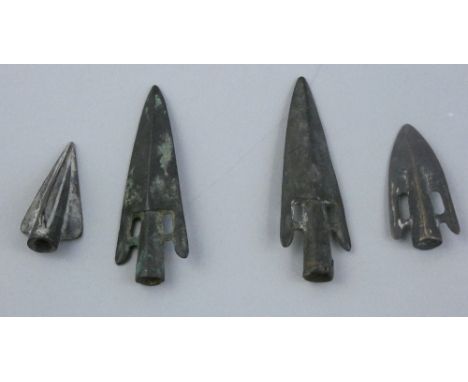 A Roman tri-blade arrow head, together with three Roman Swallow tail arrow heads (4).