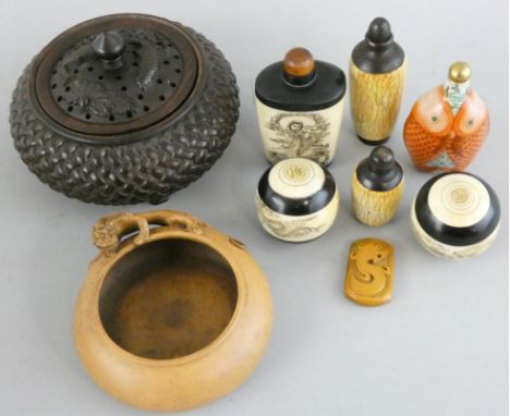 A Chinese carved hardwood bowl, with basket weave decoration, the pierced lid with Koi Carp, diameter 13 cm, four scent bottl