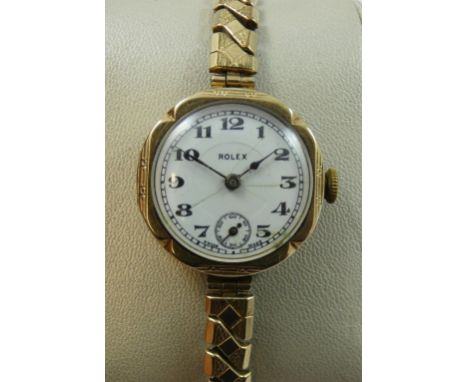 Rolex, a 9ct gold ladies manual wind wristwatch, Glasgow 1929, the white dial with subsidiary seconds dial, 15 jewel movement