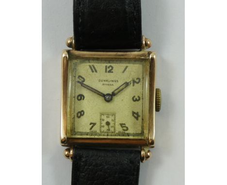 Dunklings, a 9ct gold manual wind gentleman's wristwatch, c. 1953, the square silvered dial with subsidiary seconds dial sign