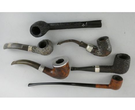 A Barling Sandblast pipe, unused, with pouch, guarantee, booklet and box, a Paterson's Chuch Warden pipe, boxed, a Paterson D