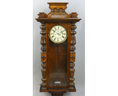 Gustav Becker, a 19th century Vienna style two weight wall clock, the two part dial with Roman numerals, striking on a gong, 