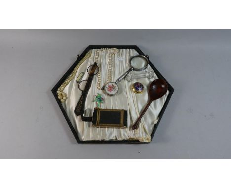 A Tray of Curios to Include Magnifying Glass, Knife Rest, Costume Jewellery, Treen Spoon, Novelty Powder Compact in the Form 