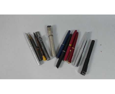 A Collection of Eleven Vintage Fountain and Ball Point Pens 