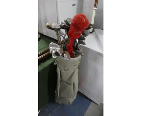 A Golf Bag and Set of Vintage Golf Clubs 