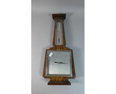 A Wall Hanging Art Deco Oak Framed Aneroid Wall Barometer with Thermometer, 47.5cm High 