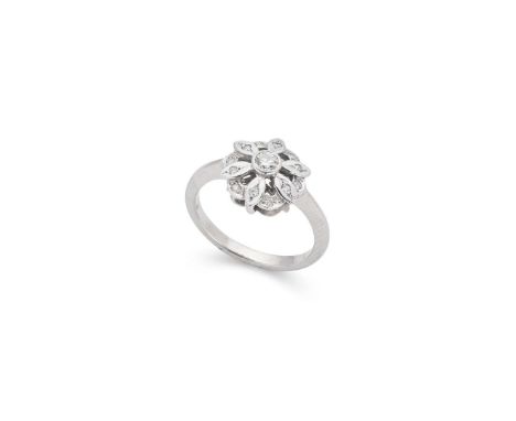  † A 9ct white gold diamond cluster ring  Collet-set with a round brilliant-cut diamond, in a floral surround set with smalle