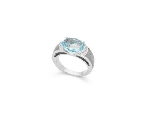  † Victor Mayer: A 'Peacock' ring  Claw-set with an oval mixed-cut aquamarine, each shoulder set with four round brilliant-cu