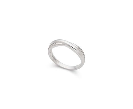  † An 18ct white gold diamond ring  Set at intervals with small round brilliant-cut diamonds, UK hallmarks Ring size: K/L  Th