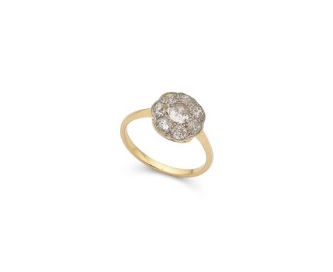  A diamond cluster ring  Set with eight old round-cut diamonds, unmarked Ring size: O   
