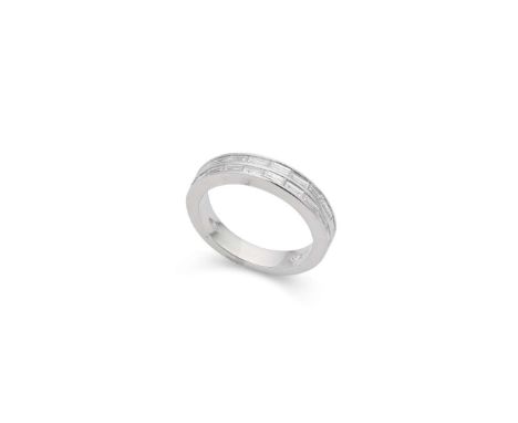  † A platinum diamond half-eternity ring  Channel-set with two rows of baguette-cut diamonds, UK hallmarks Ring size: M  This