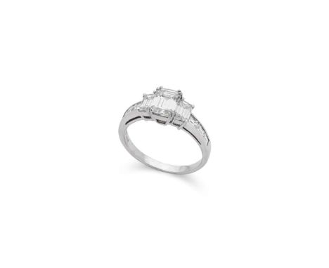 † Picchiotti: An 18ct white gold diamond three-stone ring  Claw-set with three graduated cut-cornered rectangular-cut diamon