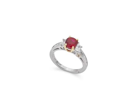  † Picchiotti: A platinum ruby and diamond three-stone ring  Claw-set with a cushion-cut ruby, weighing approximately 1.65cts