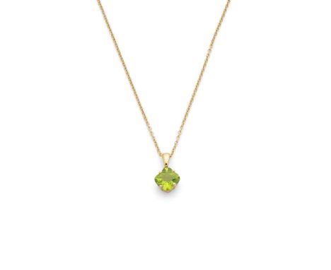  † A peridot pendant necklace  Claw-set with a fancy mixed-cut quatrefoil peridot, stamped 18k; to a trace-link chain, stampe