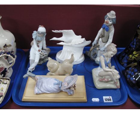 Royal Doulton Images White Porcelain Model of Swans in Flight, Nao clown, Casades clown and ballerina figures etc:- One Tray