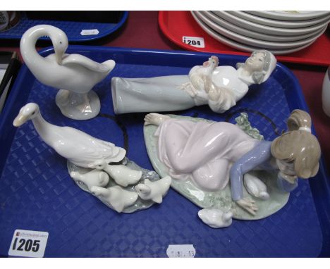 Lladro Figure "Playful Friends", a young girl playing with ducks; another of a young girl carrying chicken and two duck figur