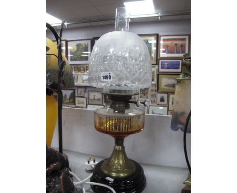 A Late XIX Century Oil Lamp, with fluted clear glass well and etched shade on circular base.