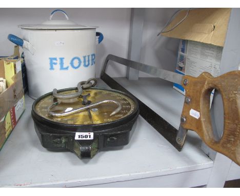 Enamelled Flour Tin, brass faced Butchers hanging scales and saw. (3)