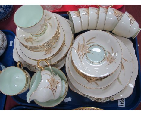Paragon Bone China Tea Service, Wheat decoration on cream ground with green interiors, approximately forty nine pieces.
