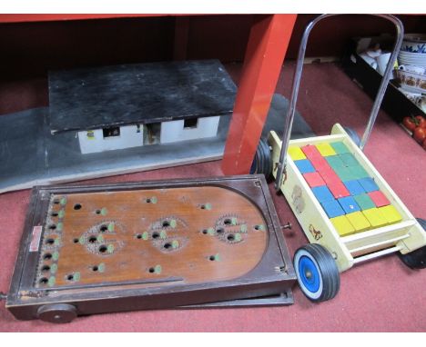 A Table Top Bagatelle Board, child's walker, and a model train shelter. (3)