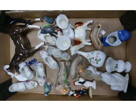 A mixed collection of items to include Wedgwood Wild Strawberry Vases, Nao pottery dog, Beswick Droopy, etc 