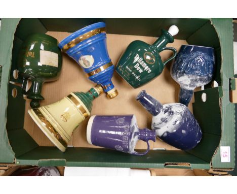A collection of Wade Whisky &amp; Spirt Decanters to include Bells, Tullamore Dew, Chivas, etc .  These items were removed fr