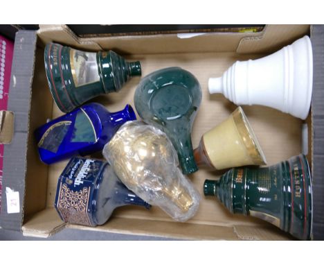 A collection of Wade Whisky &amp; Spirt Decanters to include Bells, Glenfiddich , Chivas .  These items were removed from the