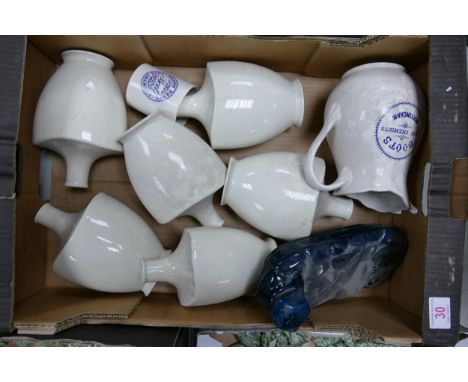 A collection of Wade Boots Chemist Adverting Jugs, Vases, Bed Warmer etc .  These items were removed from the archives of the