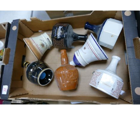 A collection of Wade Whisky &amp; Spirt Decanters to include Bells, Glenfiddich , Chivas .  These items were removed from the