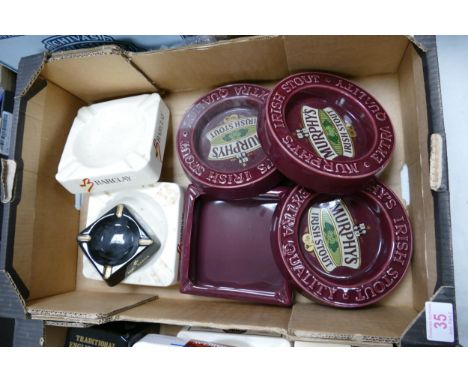 A collection of Wade Advertising Ashtrays including Murphy's, Barclays Bank, Remy Martin etc   .  These items were removed fr