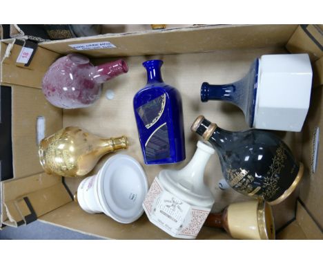 A collection of Wade Whisky &amp; Spirt Decanters to include Bells, Glenfiddich , Chivas .  These items were removed from the