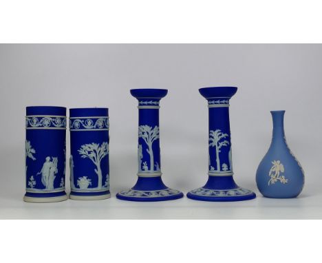 A pair of Wedgwood dipped blue candlestick and a pair of spill vases together with a jasperware bud vase 