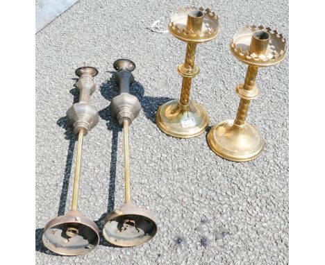A pair of ecclisiastic spiral fluted brass lamps together with two metal light fittings 