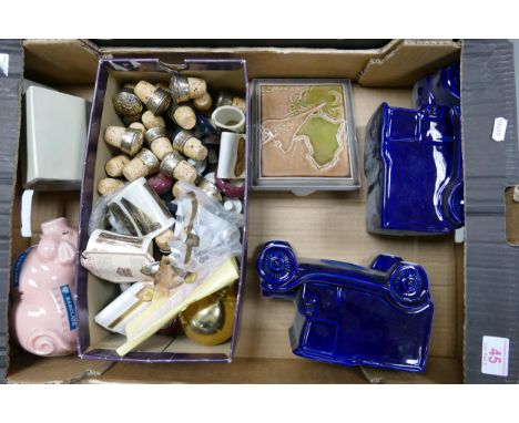 A collection of Wade Advertising Plaque, Money Boxes, Chivas Cork Tops, Concorde Ceramic plaque etc  .  These items were remo