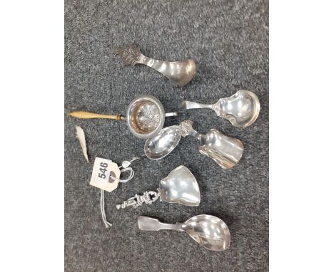 SILVER TEA STRAINER WITH IVORY HANDLE TOGETHER WITH 5 CONTINENTAL SILVER/PLATE CADDY SPOONS