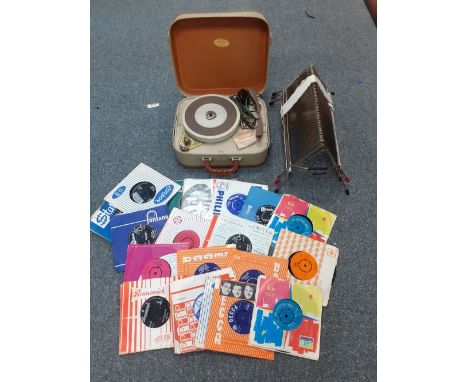 FIDELITY PORTABLE RECORD PLAYER TOGETHER WITH OVER 100 EARLY 1960S SINGLES, IN IMMACULATE, UNUSED CONDITION. 3 RECORD STANDS
