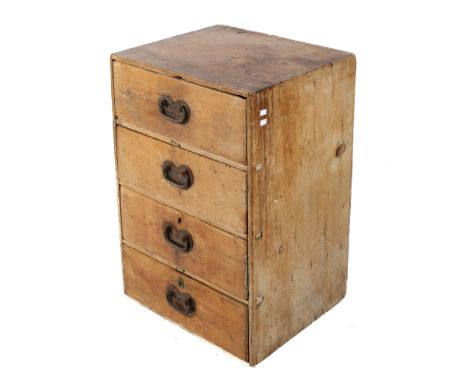 A rustic vintage pine chest of drawers with iron handles. Of four drawers. H92cm x W61cm x D52cm