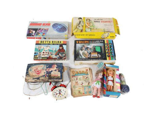 A collection of assorted vintage toys and games. Including Binatone TV Game Mk 10 (model 01-4842) and a Mickey Mouse alarm cl