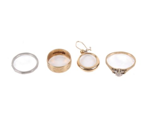 Three rings and a single earring. Comprising a 9ct gold diamond ring (missing two of the three stones, size L, 1.3g gross, a 