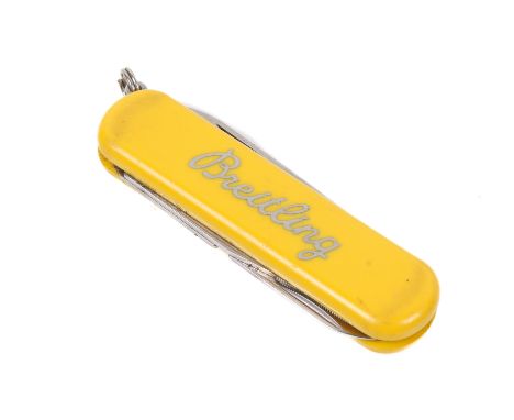 A Breitling Wenger Army knife. In a yellow case, L6.5cm